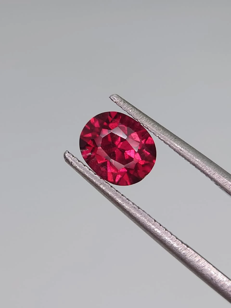 1.37ct Natural Oval Faceted Malaya Garnet from Tanzania — view 4